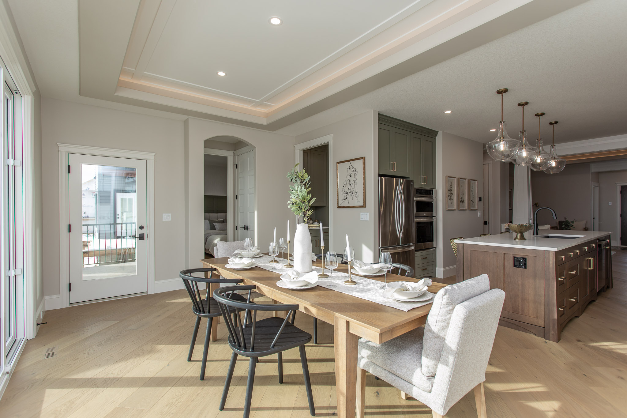 dining table and chairs in brightly lit space