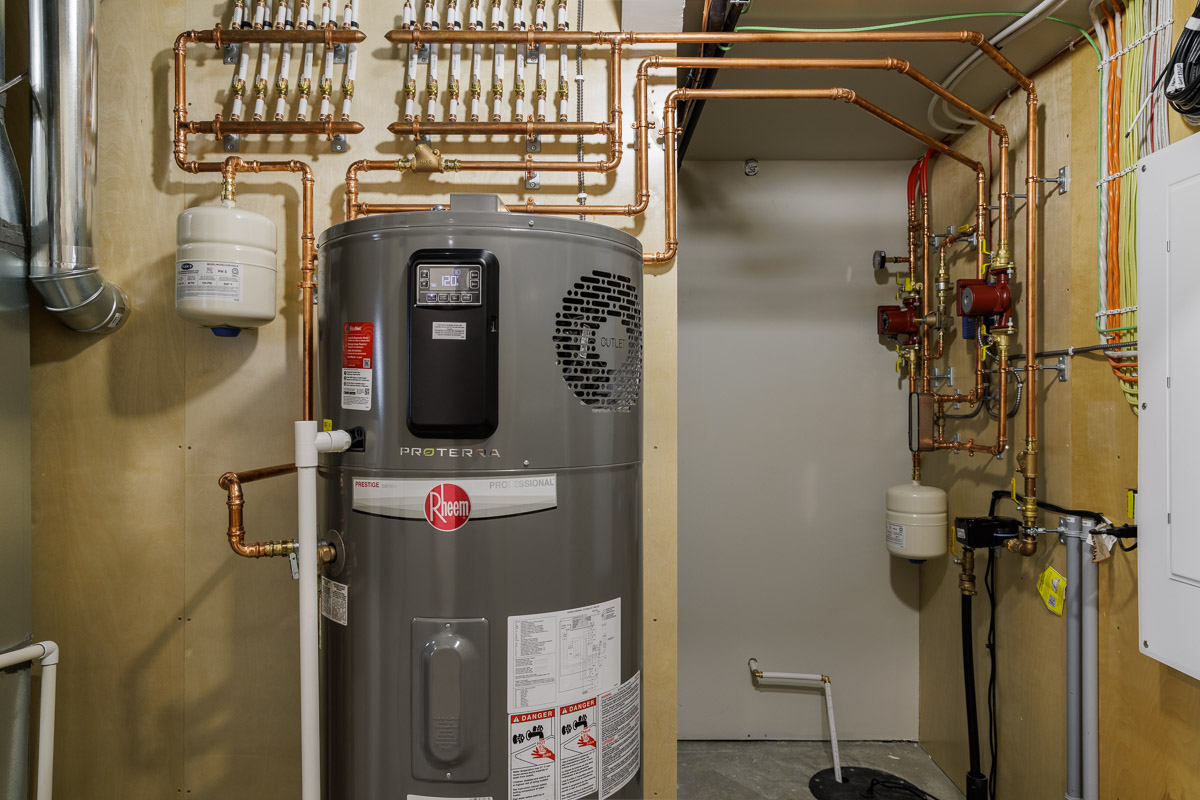 heat pump hot water tank in mechanical room