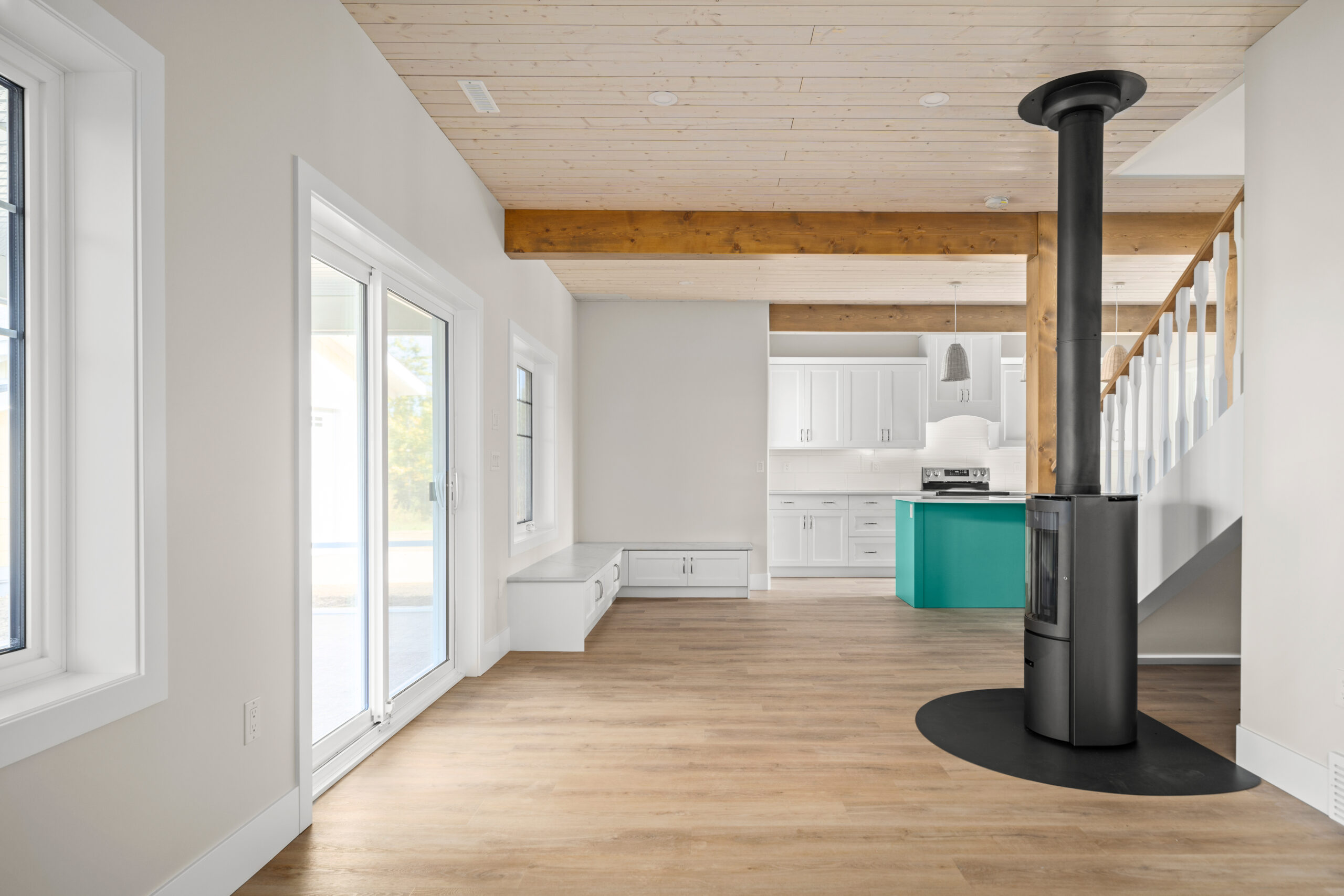 wood-burning fireplace on the right, patio doors on the left