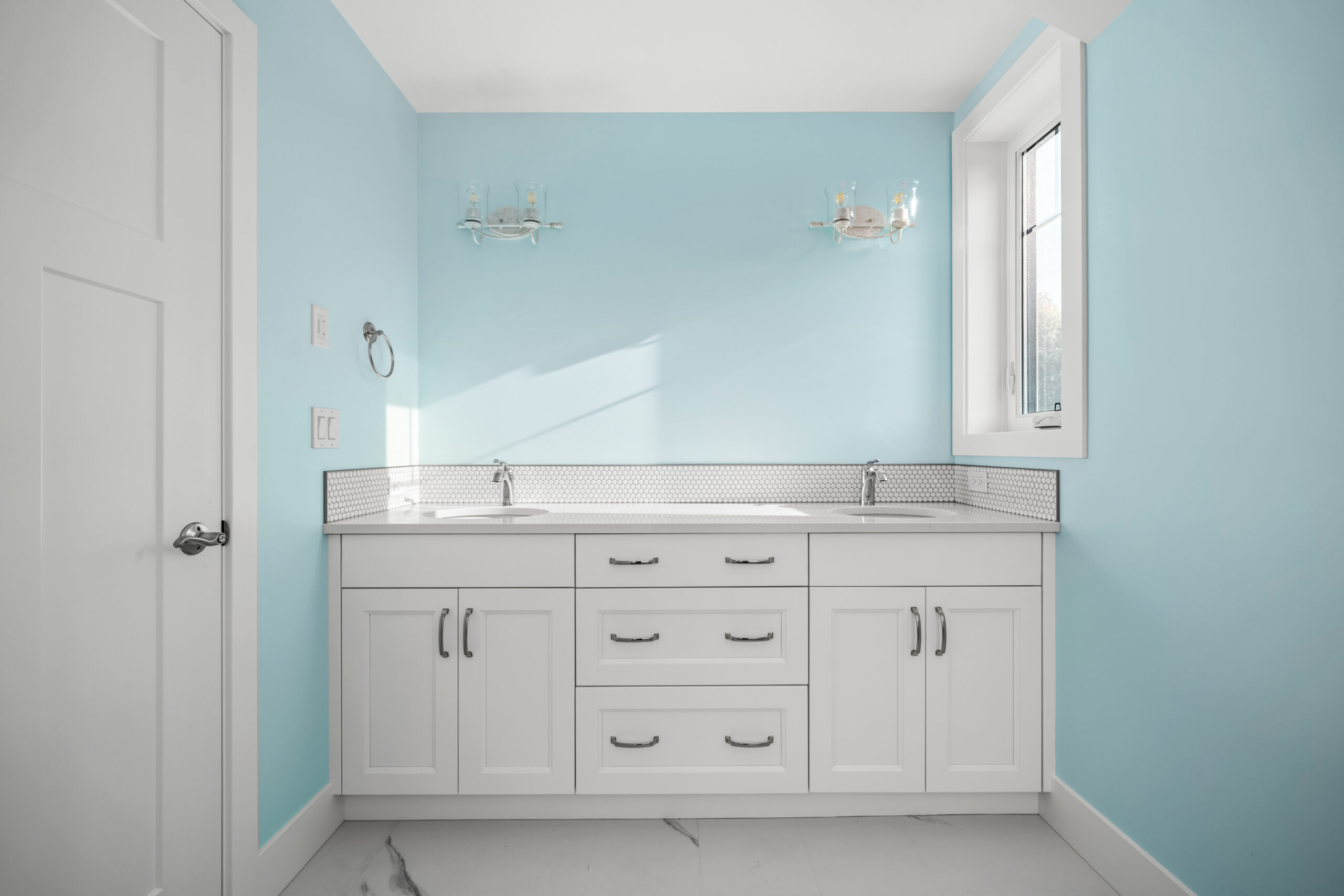 bathroom counter with two sinks