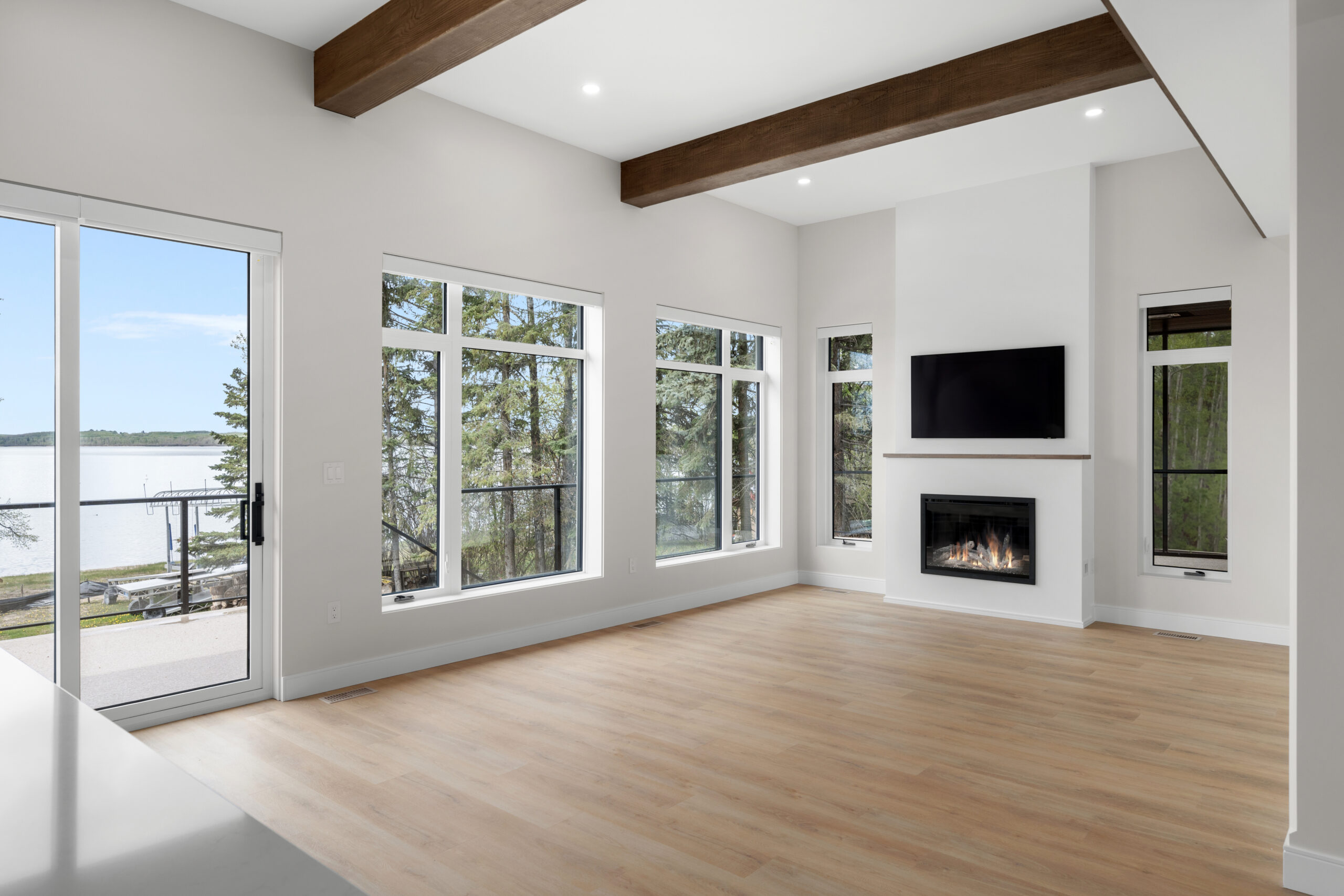 living room with electric fireplace in a net zero home