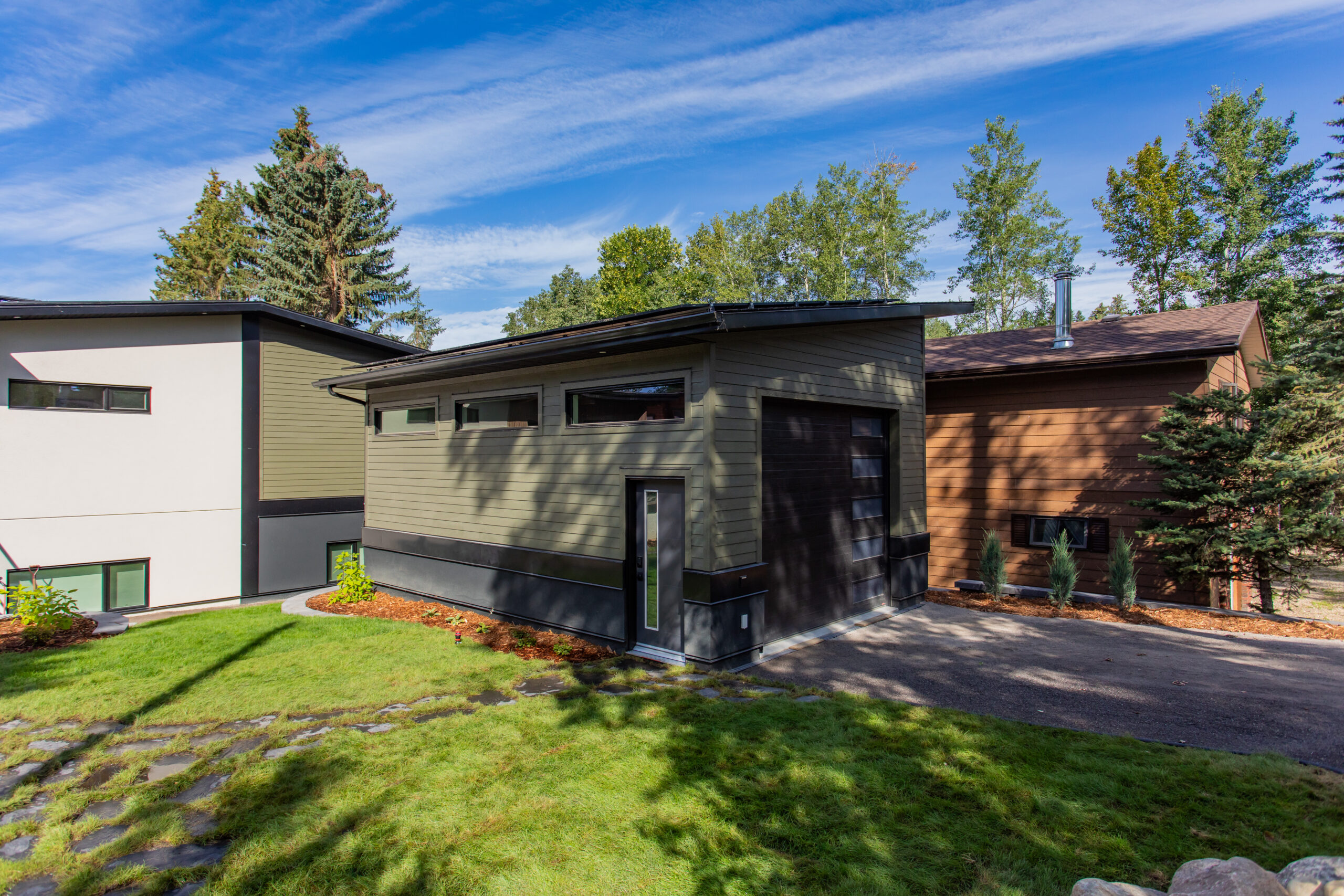 net zero home with garage in foreground