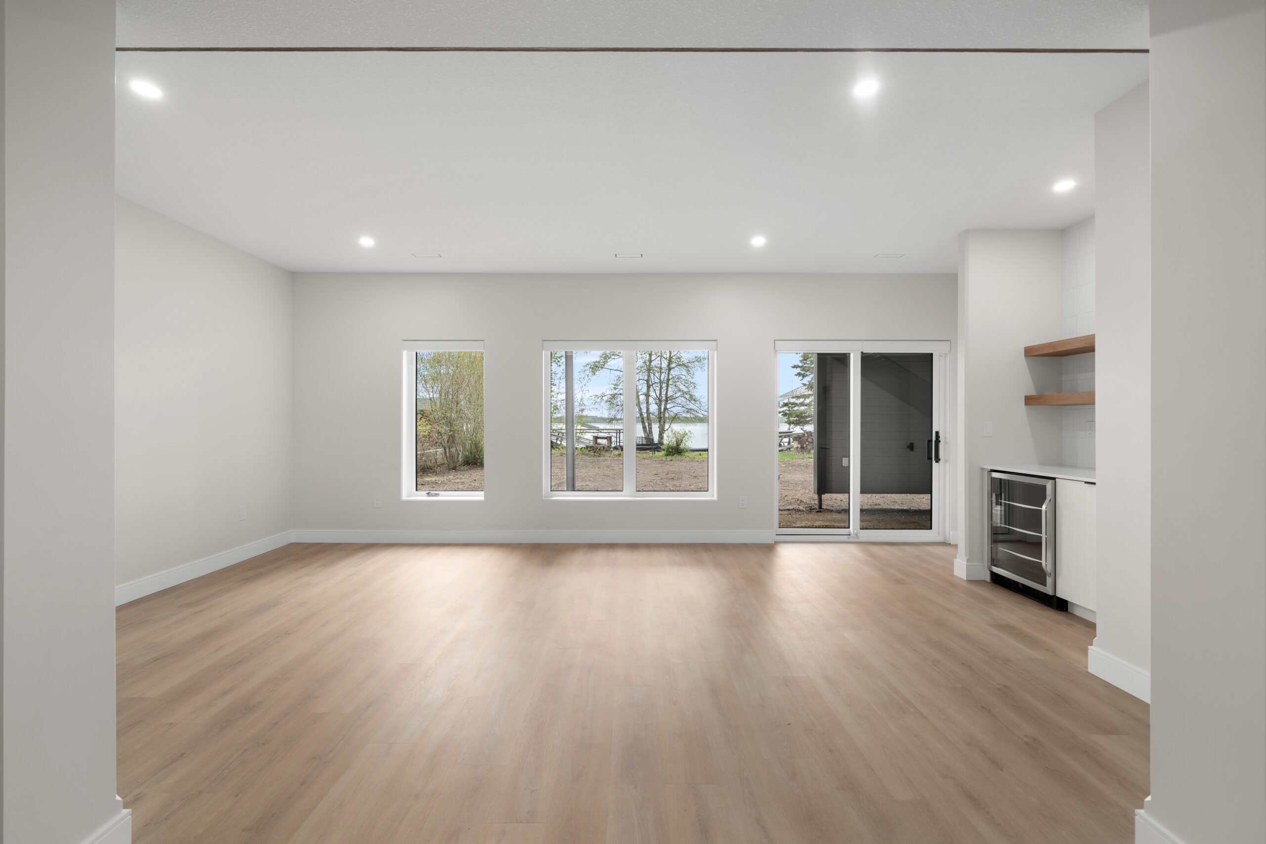 living space area in the walk-out basement of a net zero home