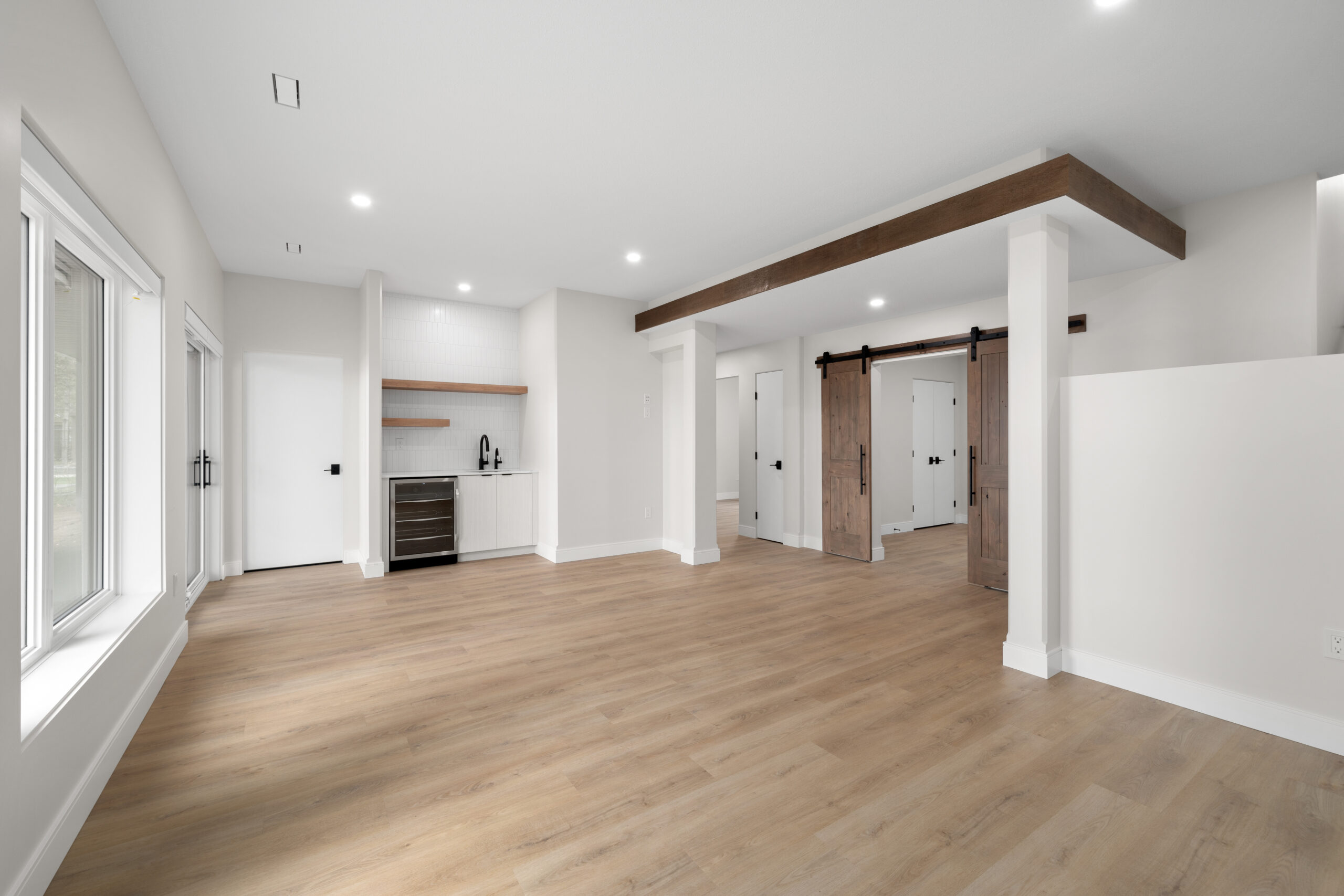 living space area in the walk-out basement of a net zero home