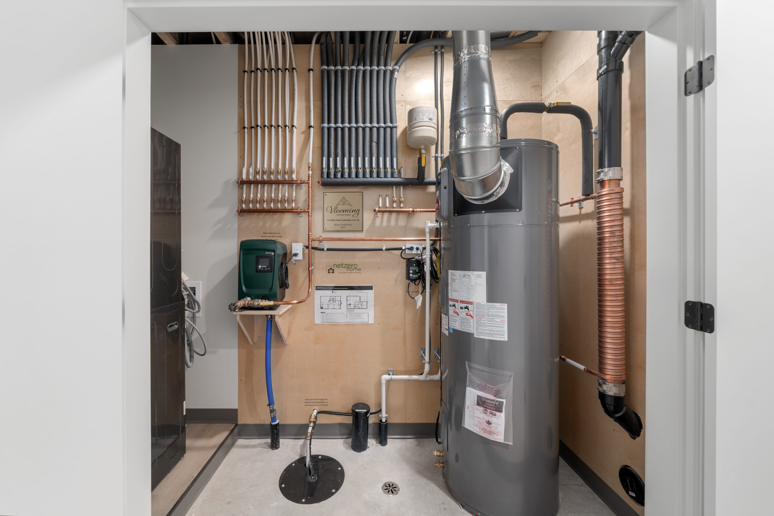 mechanical room in the walk-out basement of a net zero home
