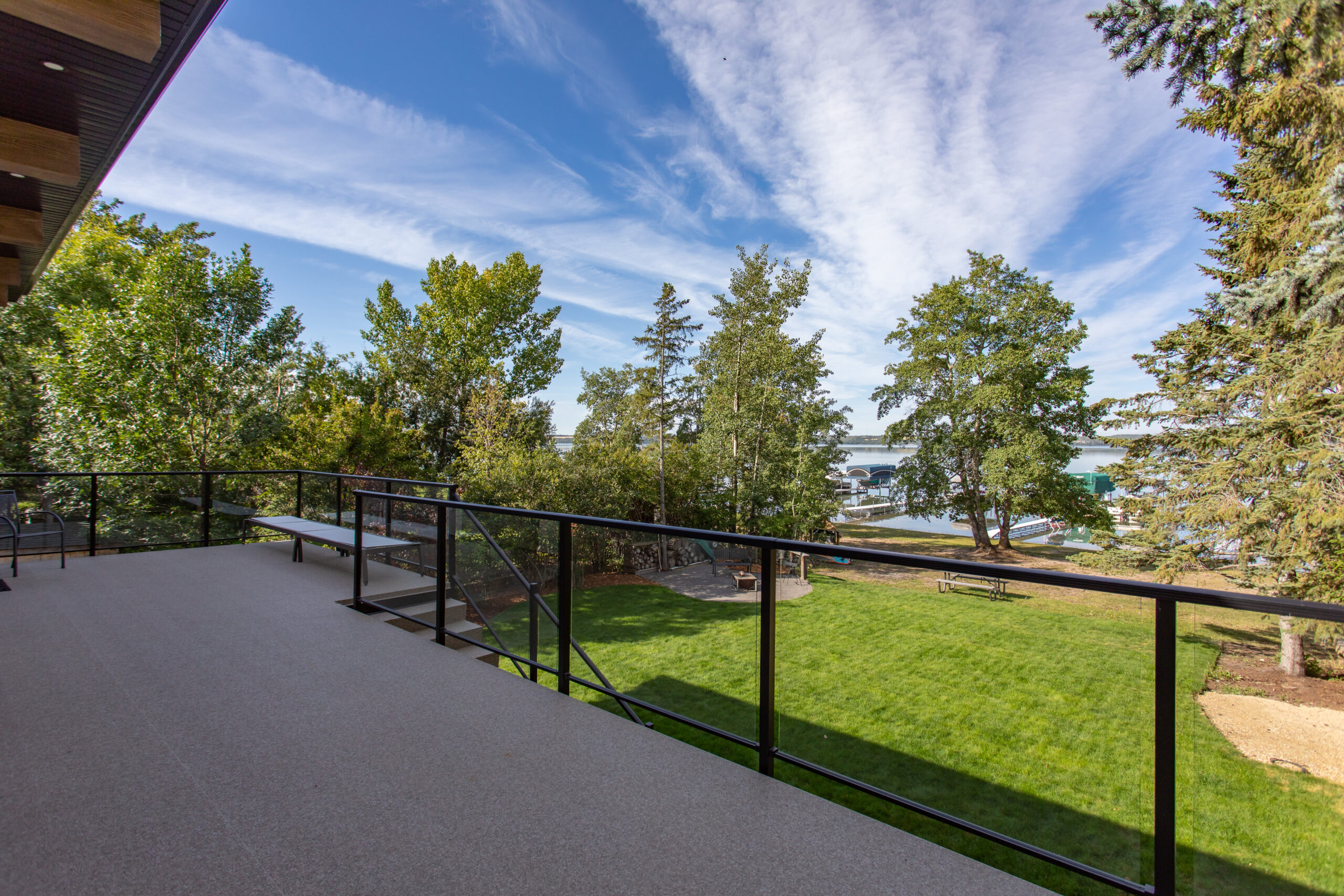 upper deck space of a net zero home with views of Sylvan Lake