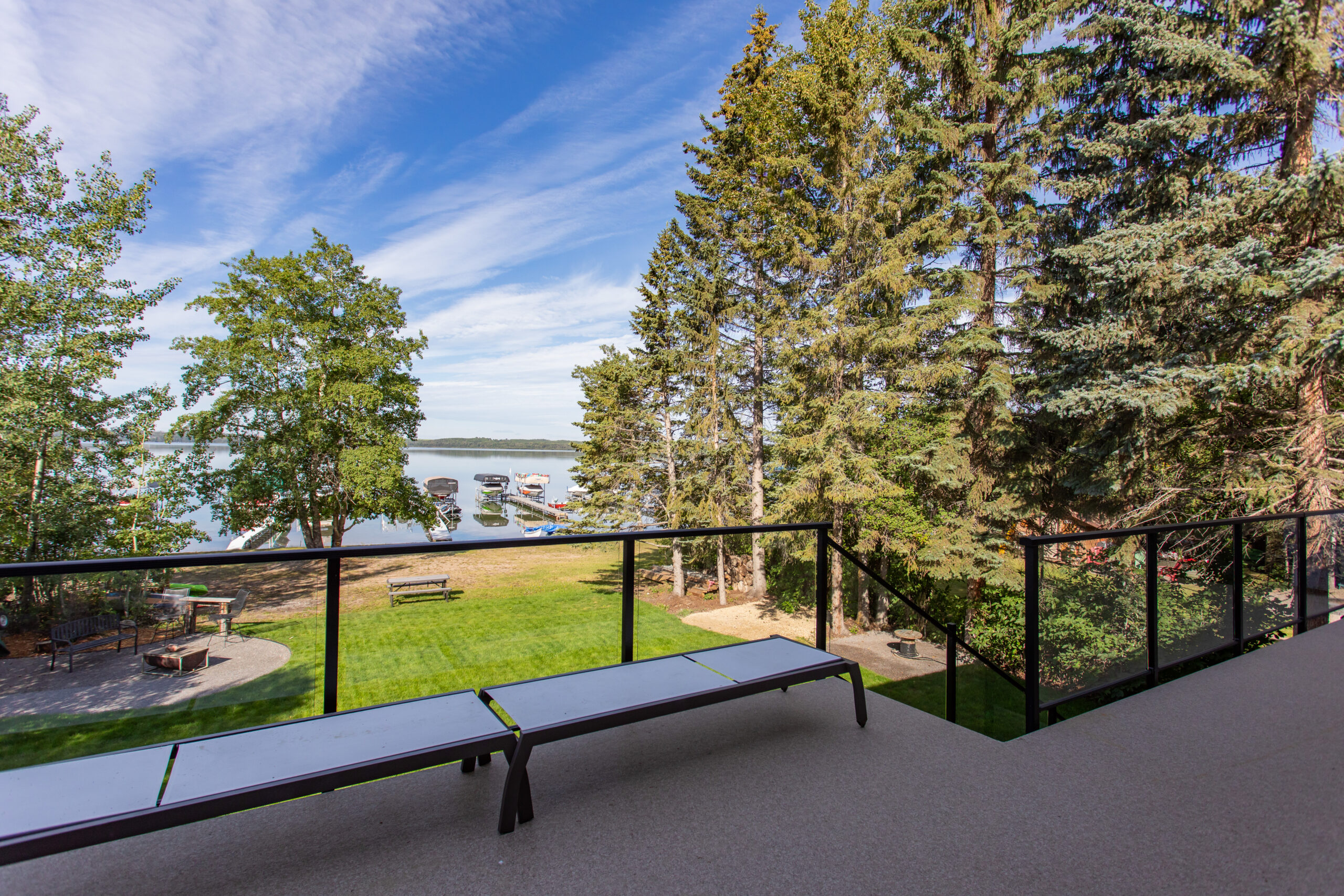 upper deck space of a net zero home with views of Sylvan Lake